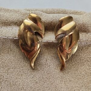 Leaf shaped earrings on wire shepherd hook. EUC